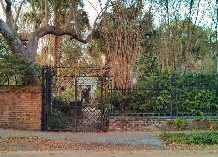 Charleston gardens are most often guarded by beautiful walls and gates. This is a great example on South Battery,