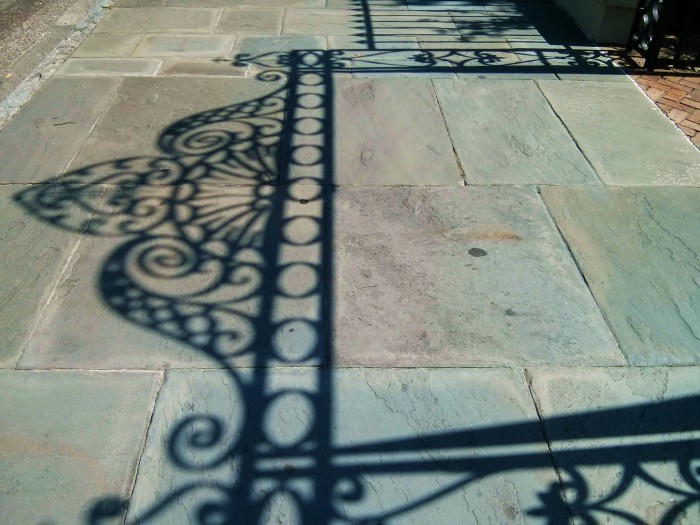 In a town of incredible ironwork, the shadows created by it are their own works of art. Charleston, SC is full of magic in many forms.