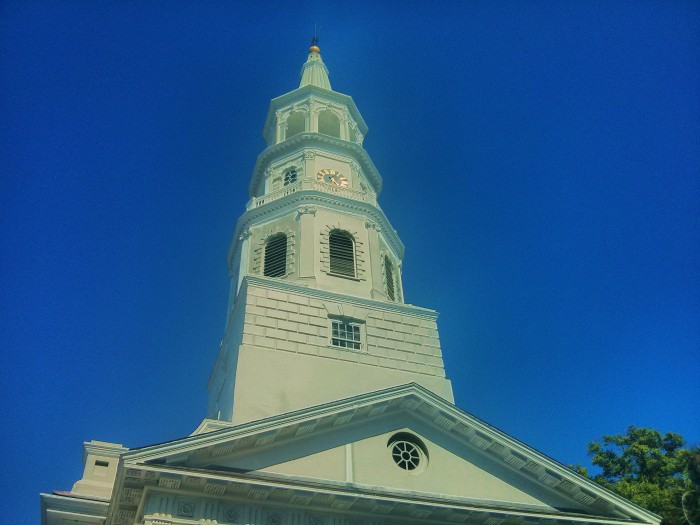 The steeple of St. Michael's Church in Charleston, SC is one of the most recognizable in the Charleston skyline. It's spectacular against a vivid blue sky.