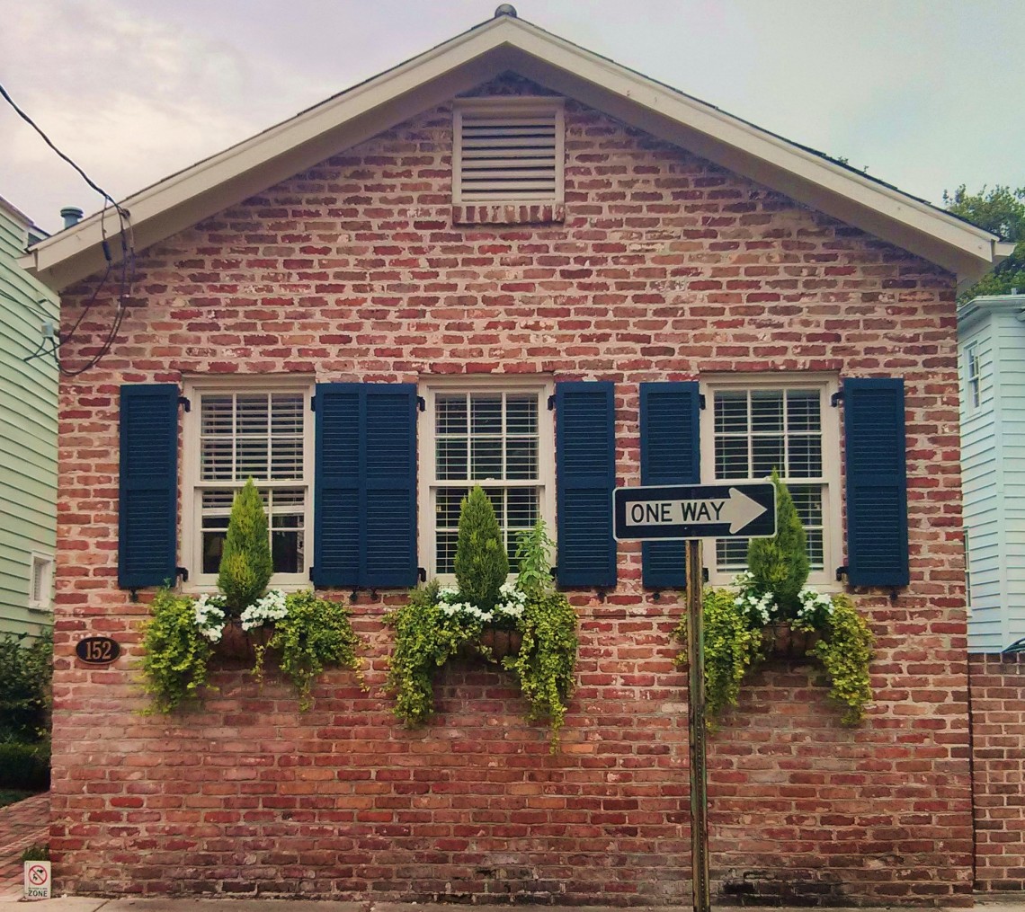 This little brick house in Charleston, SC has some beautiful windowboxes.