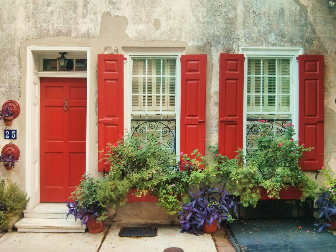 Charleston has beautiful houses and beautiful houses with beautiful flower boxes.