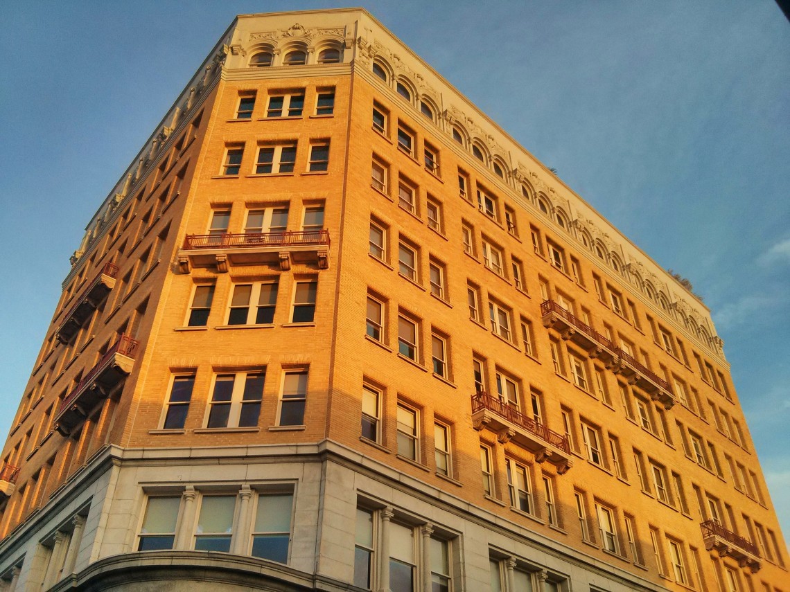 While Charleston, SC is known as a city with a very low skyline (in keeping with its colonial roots and showcasing its church steeples), there are a few exceptions. This is the People's Building on Broad Street, glowing in the very early morning sun.