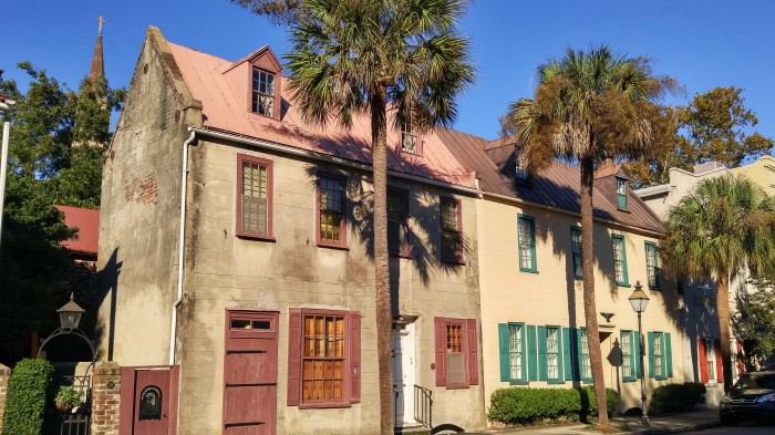 This row of colonial era houses in Charleston, SC is just beautiful. Adding to the scene is the steeple of St. Philip's Church peeking up.