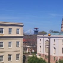 An unusual view of the Charleston, SC skyline, including St. Philip's Church, and old fire tower and THE bridge.
