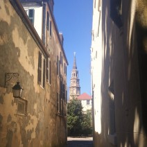 A beautiful view of St. Philip's Church from the cobblestoned Lodge Alley in Charleston, SC.