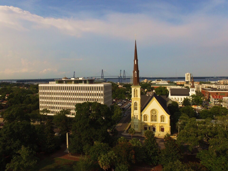 A fantastic view in Charleston of the Citadel Square Baptist Church, the Mother Emanuel AME Church, the Ravenel (Cooper River) Bridge and The Dewberry hotel (in the former L. Mendel Rivers Federal Building).