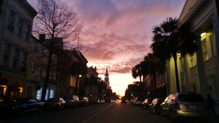 Broad Street in Charleston, glowing in the light of the setting sun.