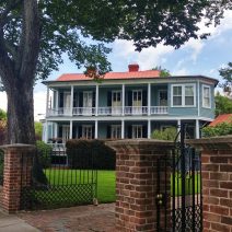 While this house looks like it could be set on a plantation in the country, it's just another downtown Charleston house... at the corner of Broad and Savage Streets.