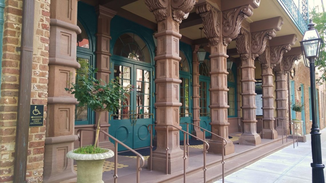 The Dock Street Theater is the oldest theater in America. It's a beautiful building, built in 1809 as an hotel, and the entry is guarded by these unusual and striking columns. It's located on Church and Queen Street.