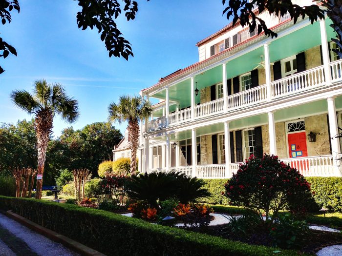 This beautiful house on Meeting Street is the John Poyas House. It was built between 1796 and 1800, but the lot was purchased by Poyas' father-in-law in 1730. A beautiful example of a Charleston garden and some "Haint Blue" piazza ceilings.