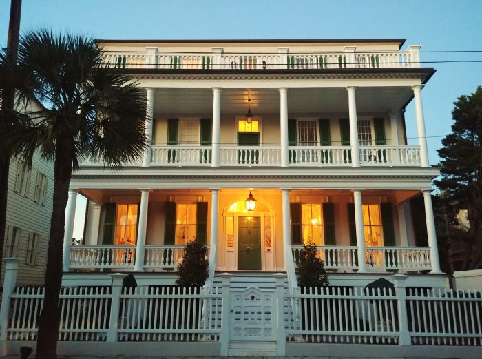 A beautiful antebellum (built in 1835) house on South Battery lighting up as the sun starts to go down in Charleston. 