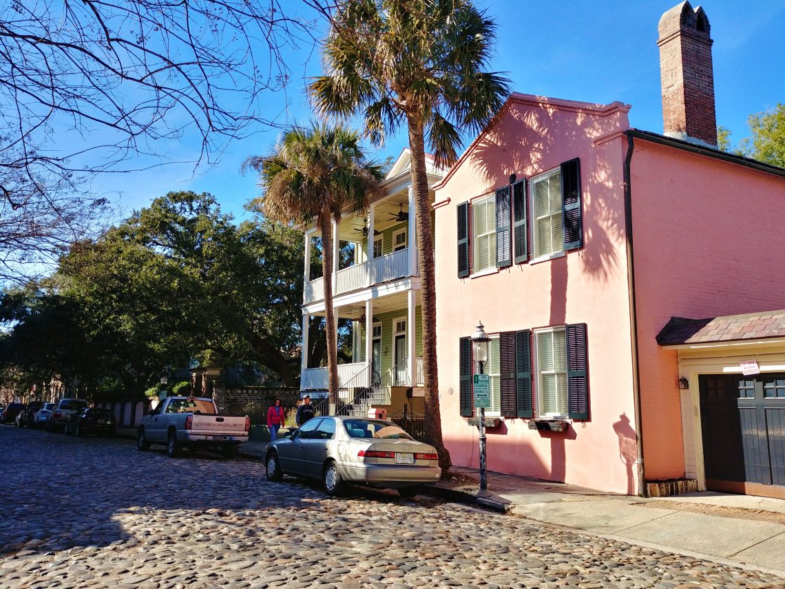 This pink house is not THE Pink House, although they are both located on the cobblestoned Chalmers Street. THE Pink House is best known for being the oldest residence in Charleston, dating back to about 1690. This pink house is a relative youngster built in about 1800.