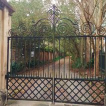 This beautiful iron gate guards the entrance to what looks like a country lane, but it is actually the entrance to a driveway on Tradd Street in downtown Charleston.