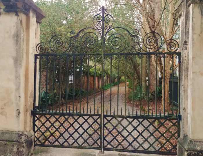 This beautiful iron gate guards the entrance to what looks like a country lane, but it is actually the entrance to a driveway on Tradd Street in downtown Charleston.