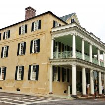 The beautiful Branford-Horry House, at the corner of Meeting and Tradd Streets, was built in 1750. In 1830s the striking portico was added -- making it one of the few buildings that extends over the sidewalk in Charleston.