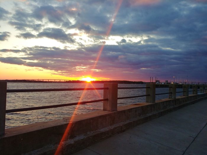 A beautiful sunset as seen beyond the Ashley River from the Low Battery. According to Charleston lore, the Ashley River and the Cooper River flow together to form the mighty Atlantic Ocean. Any arguments?