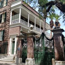 The Simmons-Edwards House on Legare Street is one of the most spectacular houses and properties in Charleston. It is ore popularly known as the Pineapple Gates House, for obvious but inaccurate reasons. The "pineapples" are actual stylized Italian pine cones. But, pineapples would be good too, as they symbolize "welcome" or "hospitality."