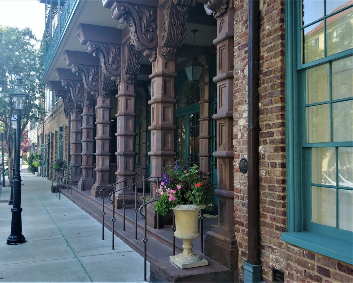 The beautiful entrance to the Dock Street Theatre.  In 1736, the Dock Street was the first theater built in America. That building, however, was destroyed -- likely by the Great Fire of 1740. The current building, erected on the same site, was the Planter's Hotel which was later restored for the theater.