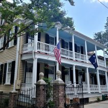 This beautiful Charleston single house on Tradd Street is nicely decked out in the American, South Carolina and US Army flags. It's called a "single house" because it is only one room wide. No matter how big or small a single house may be, that is one of their main distinguishing characteristics.