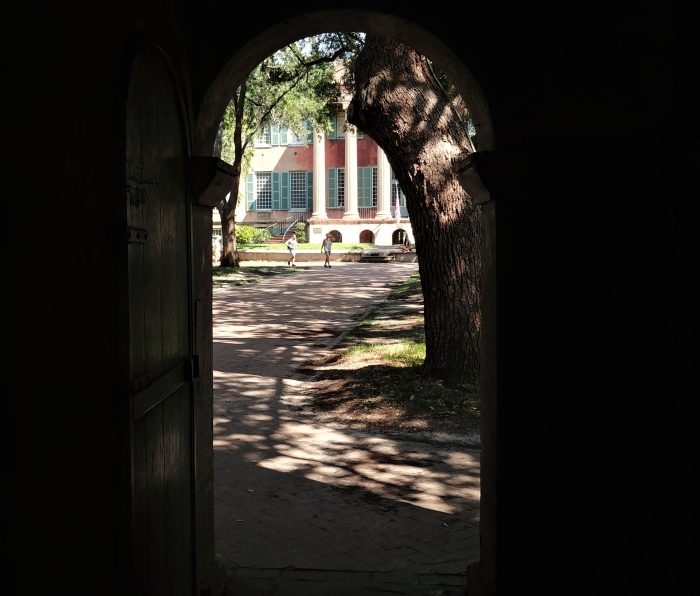 The  Porters Lodge at the College of Charleston has three passages from George Street into the Cistern Yard. Two are pedestrian-sized, as seen in this photo, one can accommodate much larger vehicles as seen here. They are all gateways on to some incredible historic beauty.