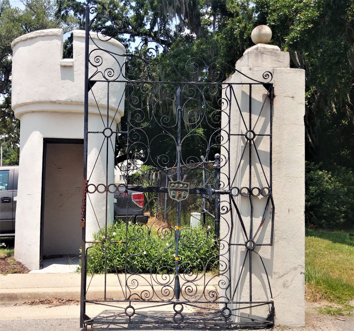 This gate, inspired by the famous Sword Gate by Christopher Werner, was actually made for General Charles Pelot Summerall's plantation in Aiken, SC.  You can see his 4 stars and initials in the shield in the center of the gate. It now hangs at the Citadel, the Military College of South Carolina and is, aptly, called the Summerall Gate. It now guards the entrance from the Citadel to Hampton Park.