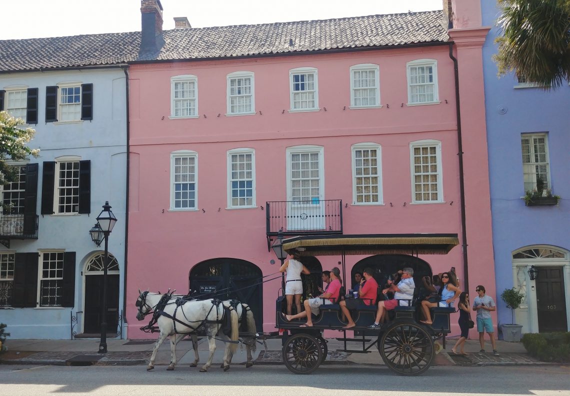 This scene of visitors, horses and pretty colors is pretty much par for the course along Rainbow Row -- the longest row of Georgian houses in the United States. While most of the houses were built in the mid/late 1700's, the youngest -- which anchors the southern end of the Row -- was built in 1845.