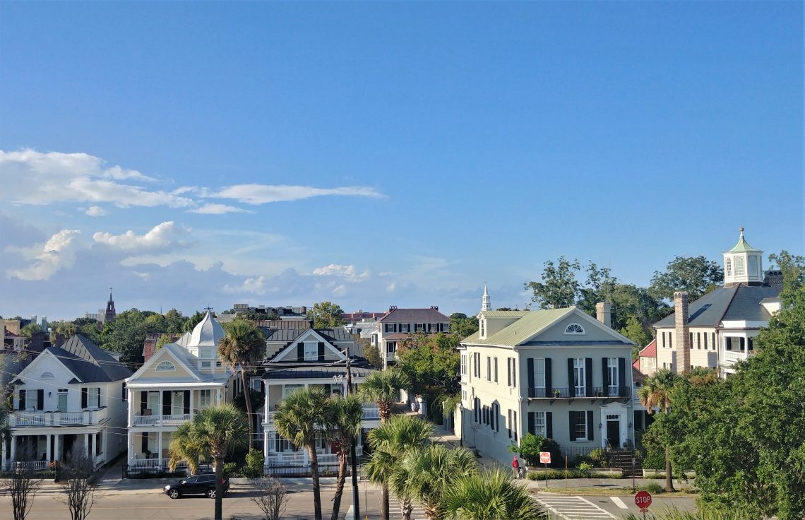 This view of part of the Charleston skyline contains two of the major steeples in town -- St. Michael's Church on the right and the Cathedral of St. John the Baptist on the left. The Cathedral's steeple (actually called a "spire") was added in 2010 (although the building opened in 1907), making it almost 250 years younger than St. Michael's. 
