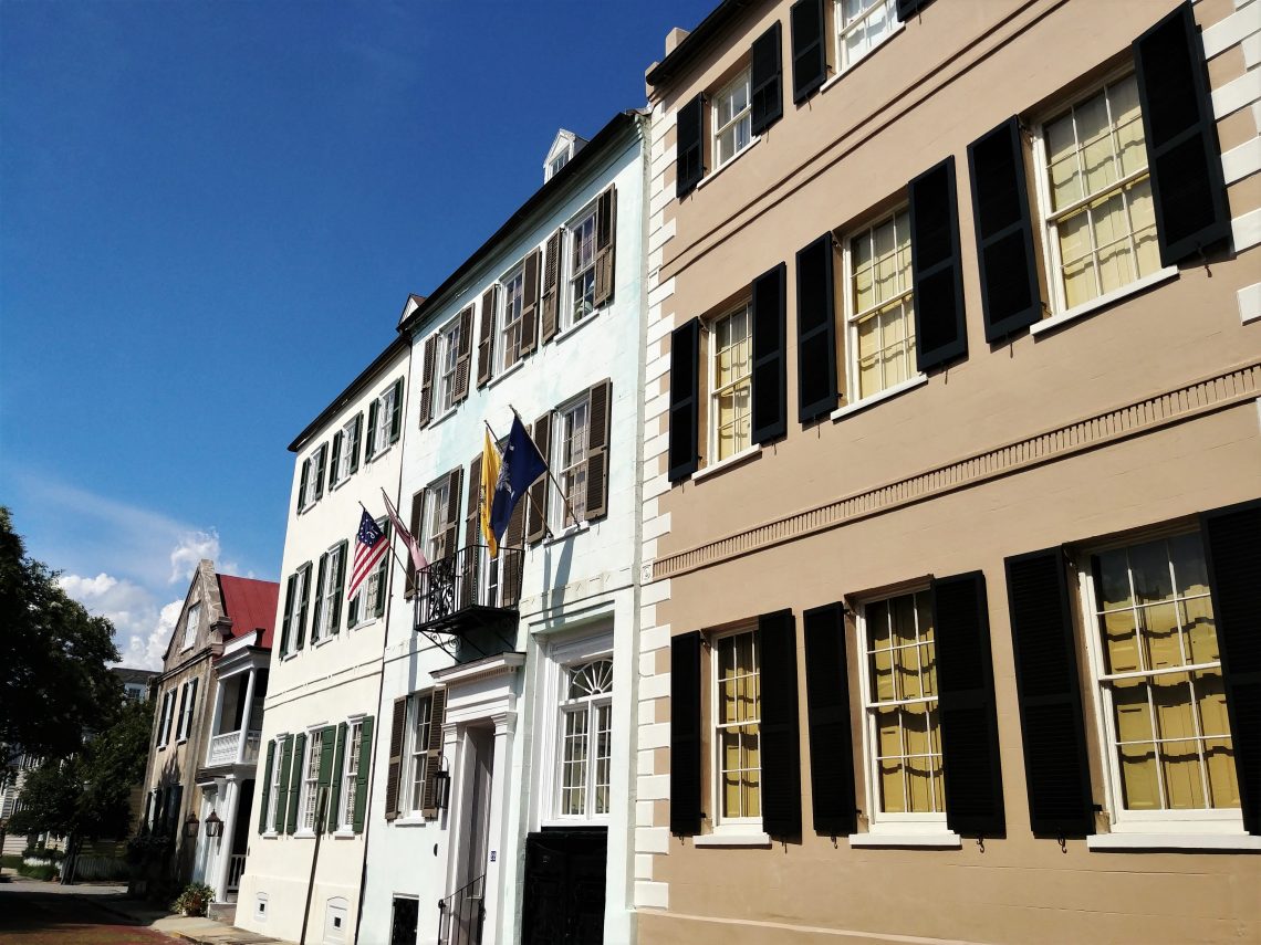 These houses on Church Street date back to the late 1700's (the one flying the flags was built in 1796). This part of Church Street is paved with bricks. It's one of the few places you will find that in Charleston.