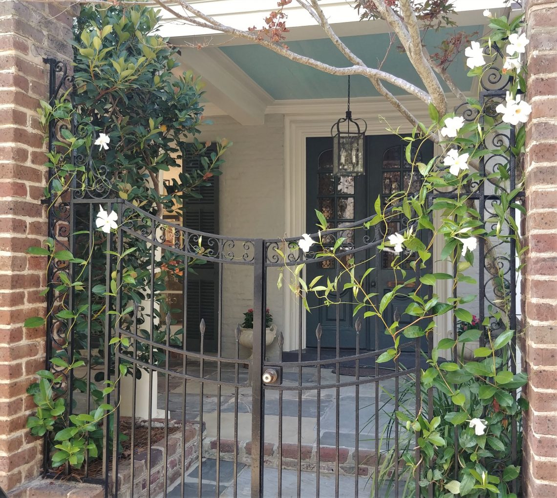 The house with this pretty entrance on Lamboll Street was erected in 1820 and now has three front facing porches. Originally built as a simple Charleston single house, the porches were added about 30 years later completely changing its look and style.