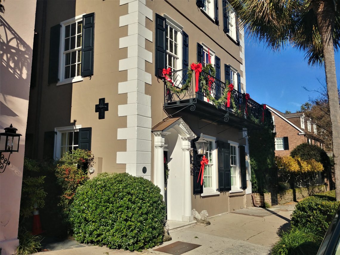 This beautiful house on East Bay Street is well dressed for the holidays.  Built in 1783, it was a rental property that even had a grocery store in the bottom at one point. The earthquake rod or bolt, the end of which is visible in the big black cross, was likely added later to help shore up the property.