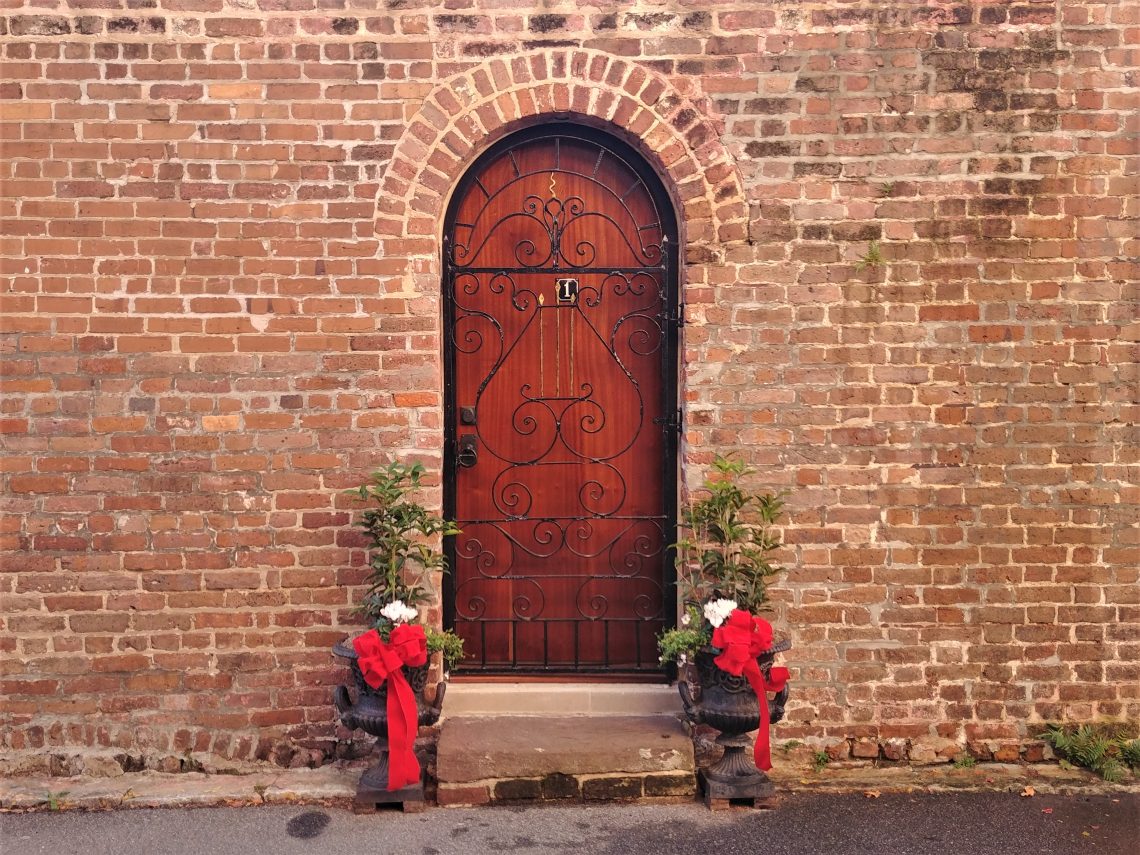 This scene is on Elliot Street, just down from Poinsett's Tavern -- whose owner introduced the Poinsettia to the United States. Some beautiful Colonial brick and holiday beauty.