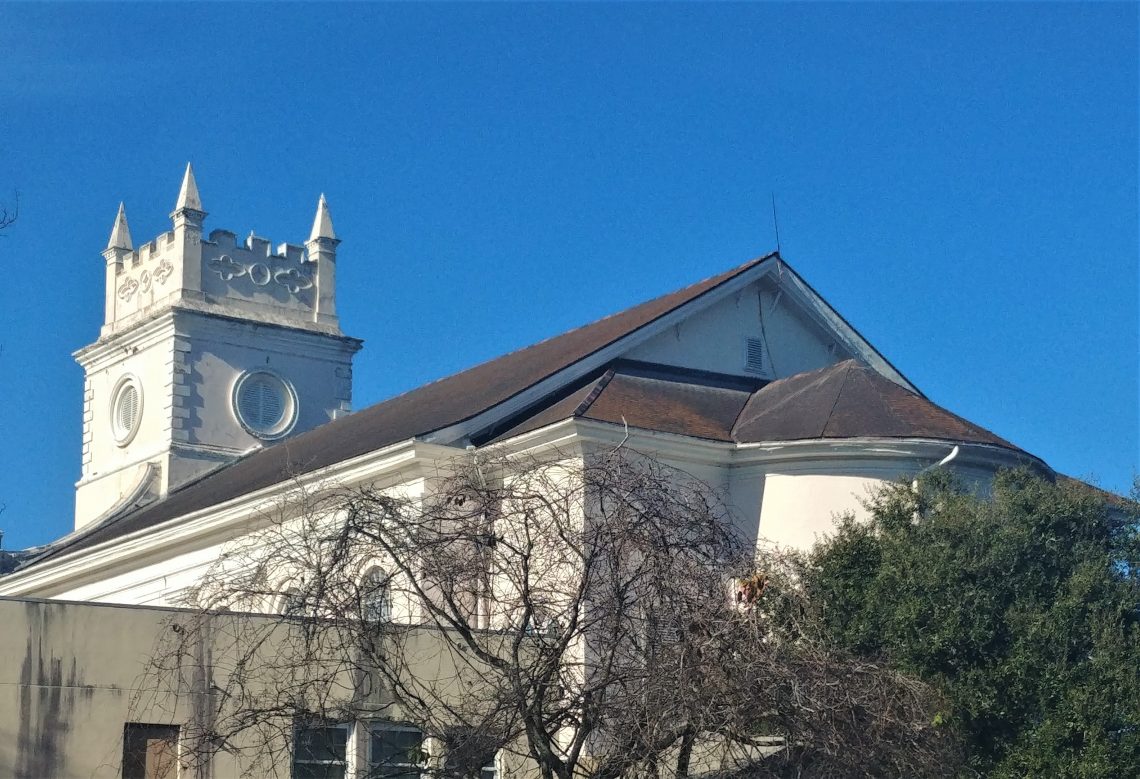 Located on Coming Street (this is a backside view), the Cathedral Church of St. Luke and St. Paul (c. 1811), is the cathedral of the Diocese of South Carolina.  Due to cost overruns and engineering difficulties, they were not able add a steeple and opted for this tower.