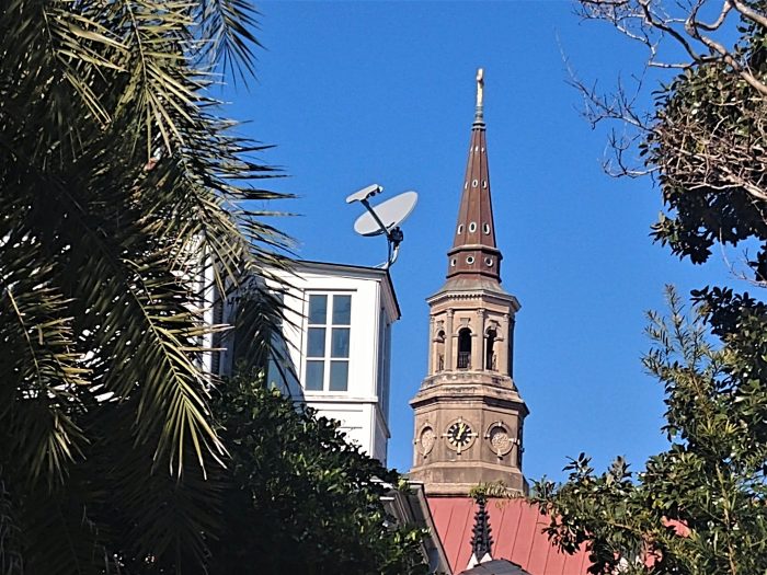 Charleston is a living city, and not a museum. The historic and the modern must, and do, coexist. Here the steeple of St. Philip's Church shares the space with some more modern technology.
