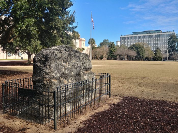 This fenced-in outcropping is the last visible remnant of a Revolutionary War structure  called the Horn Work. Part of Charleston's colonial fortifications, amazingly the Horn Work was a tabby fort the size of Fort Sumter.  Covering over 5 acres, it had 18 cannons, and was surrounded on the north side by a moat 10 yards wide.