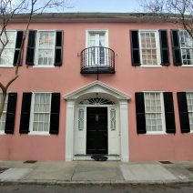 The house on Tradd Street, circa 1740, is guarded by two crepe myrtle trees -- the longest blooming plants in Charleston.