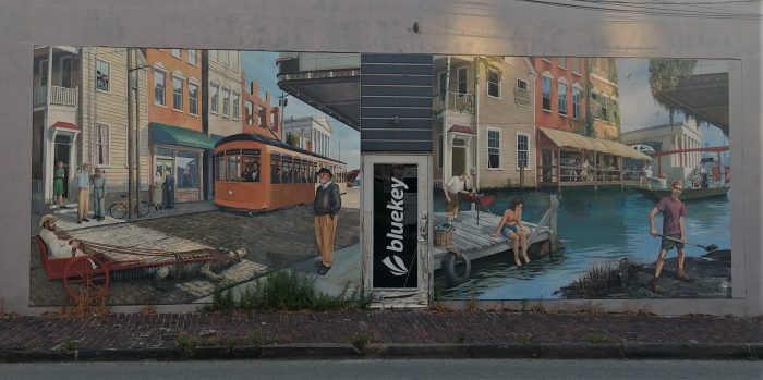 This look at Charleston past and the possible watery future was created by David Boatwright -- the artist perhaps best known for creating Hominy Grill's "Grits are good for you" mural. You can find this one on East Bay Street, just below Calhoun Street.