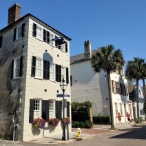 A beautiful view along State Street. The house on the left, built as a residence c. 1816. As this neighborhood near the wharves declined by the turn of the 20th century, it was used as a warehouse. It was restored as a residential house in 1950.