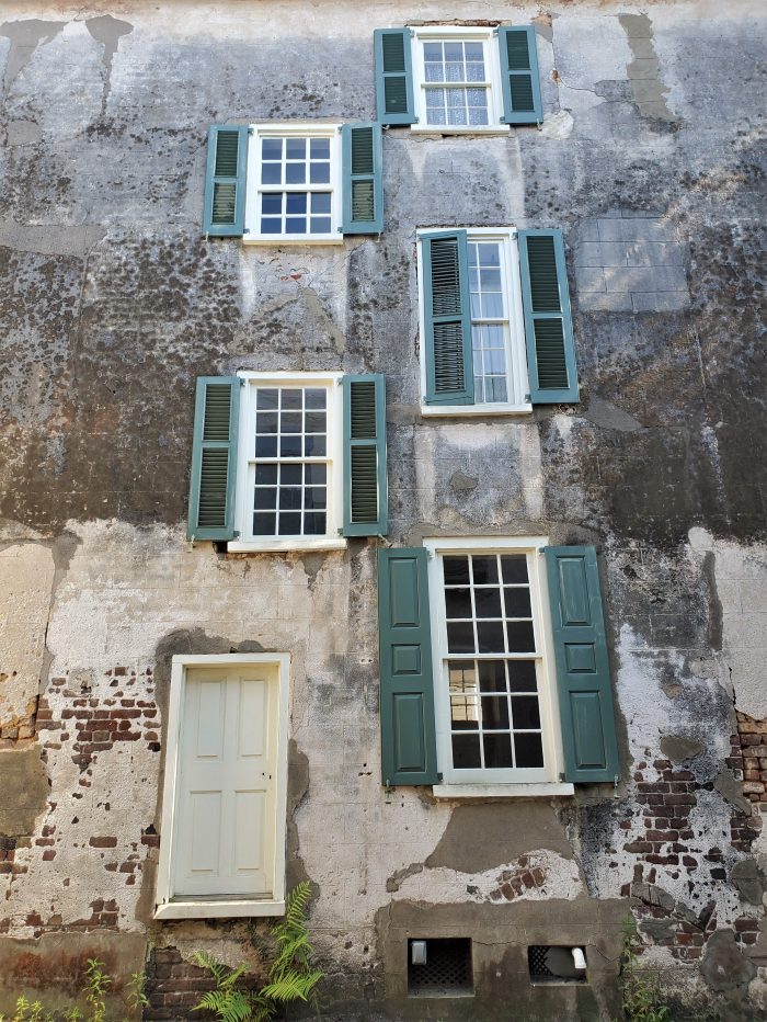 This incredible wall is actually the side of a 1783 house that fronts Church Street. The wall helps form the entrance to Stolls Alley -- which is named after a local blacksmith, Justinus Stoll.