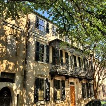 This beautiful sun-dappled house on Church Street dates back to 1785. The cast ironwork was added in the 1820's. The difference between cast and wrought iron is that cast iron comes from the molten metal being poured into a mold, while wrought iron is shaped by hand (usually the hot metal is hammered into shape). 