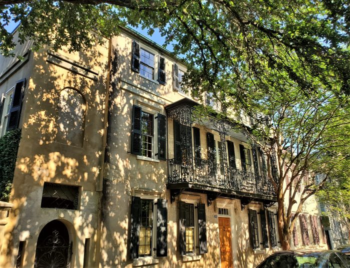 This beautiful sun-dappled house on Church Street dates back to 1785. The cast ironwork was added in the 1820's. The difference between cast and wrought iron is that cast iron comes from the molten metal being poured into a mold, while wrought iron is shaped by hand (usually the hot metal is hammered into shape). 