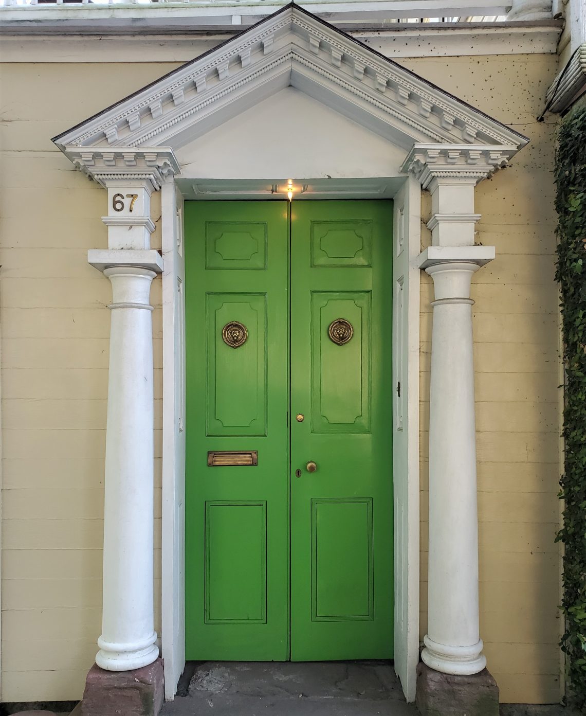 An historic door on a c. 1818 Smith Street house, across from the 60 Bull Cafe, with a very distinctly not historic light!