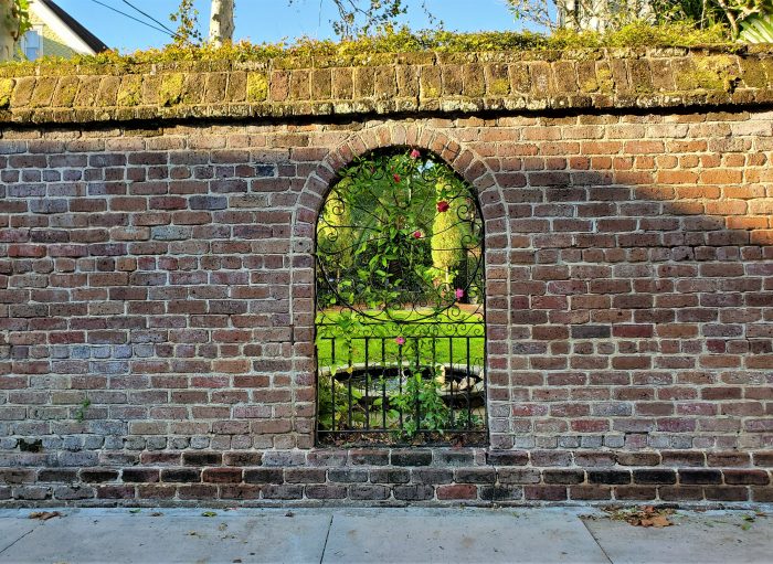 A beautiful wall, that allows a lovely view into the garden, can be found on Lamboll Street.