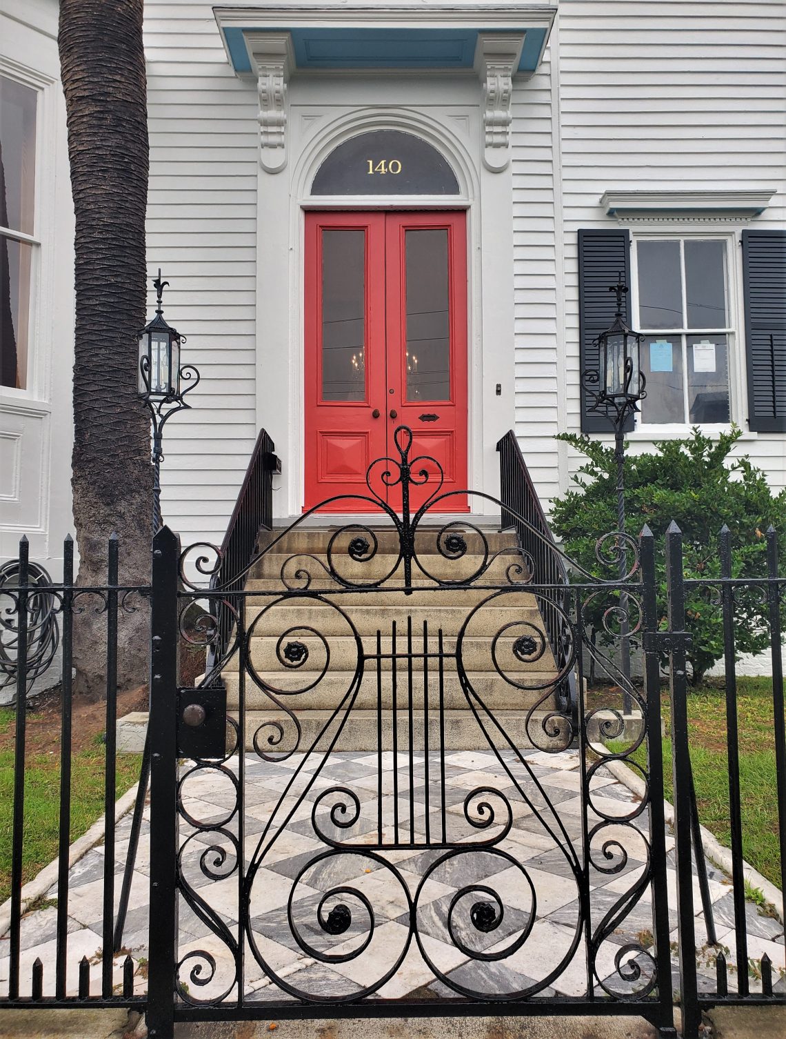 This beautiful gate, walk and door can be found in an impressive house on Broad Street. The house, built c. 1870, replaced an earlier one owned by the same man which burned down in the Great Fire of 1861 (which claimed over 575 other houses and more).