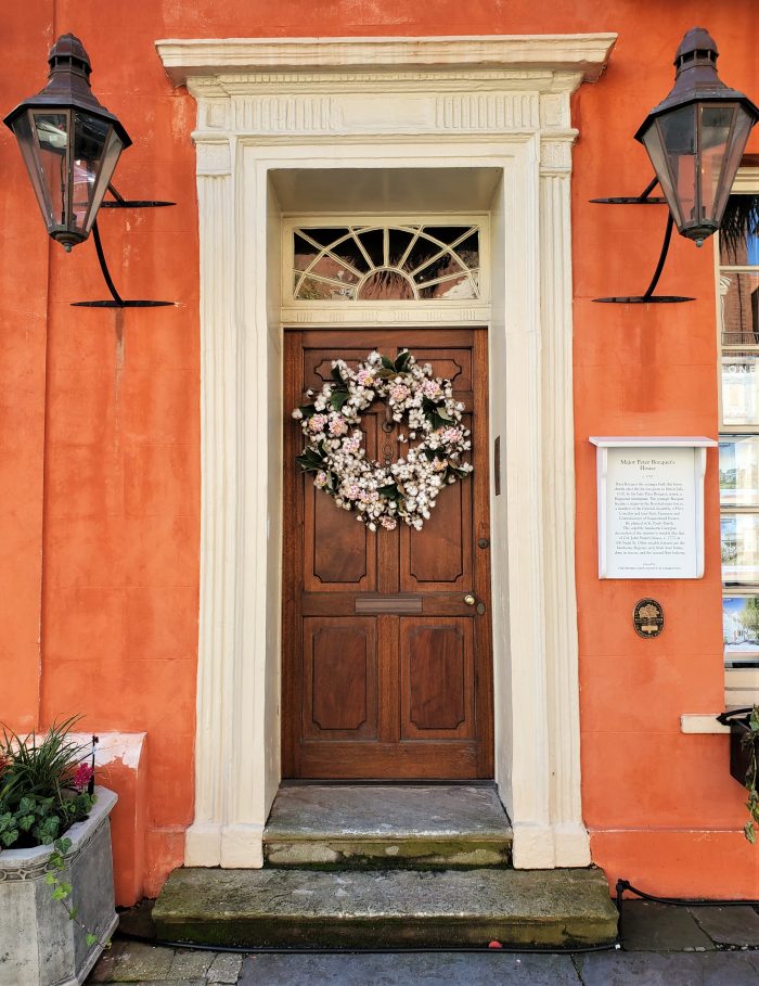 This pretty cotton ball wreath hangs on a door that fronts Broad Street... just down from the intersection of Broad and Meeting Streets, where a drawbridge once stood to allow people to enter the walled city of Charles Towne.