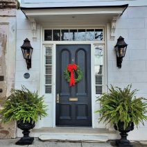 This beautiful front door scene, complete with some cool gas lights, is on Legare Street.