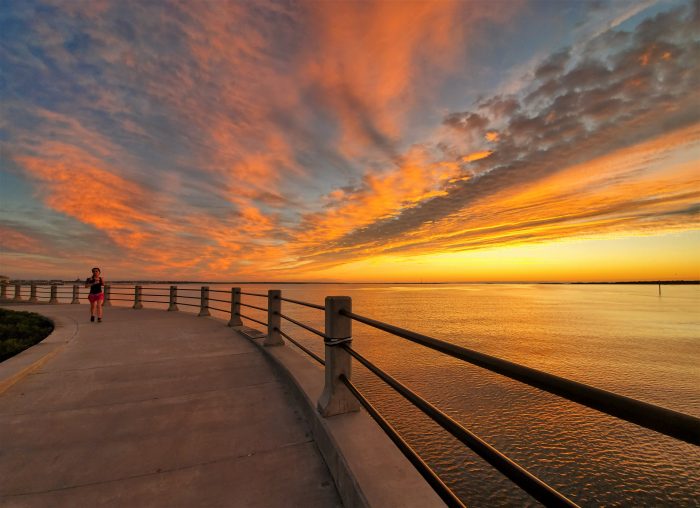 A runner under a spectacular pre-dawn sky along the Battery. Runner's World named the Battery as one of the most beautiful places in the world to run. It's hard to argue!