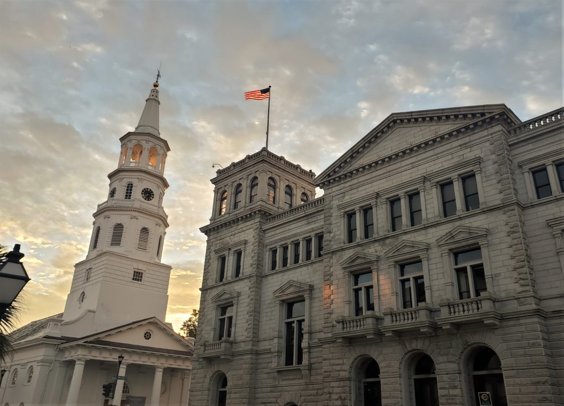 The day's first rays of sun lighting up the innards of the bell tower of St. Michael's and the flag on the Federal building.  Inside the Federal building is the wonderful Postal Museum -- a one room museum chronicling the history of the postal service in Charleston.