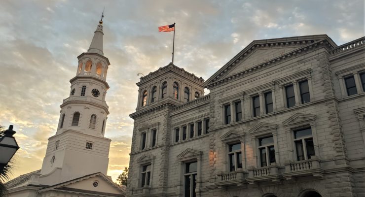 The day's first rays of sun lighting up the innards of the bell tower of St. Michael's and the flag on the Federal building. Inside the Federal building is the wonderful Postal Museum -- a one room museum chronicling the history of the postal service in Charleston.