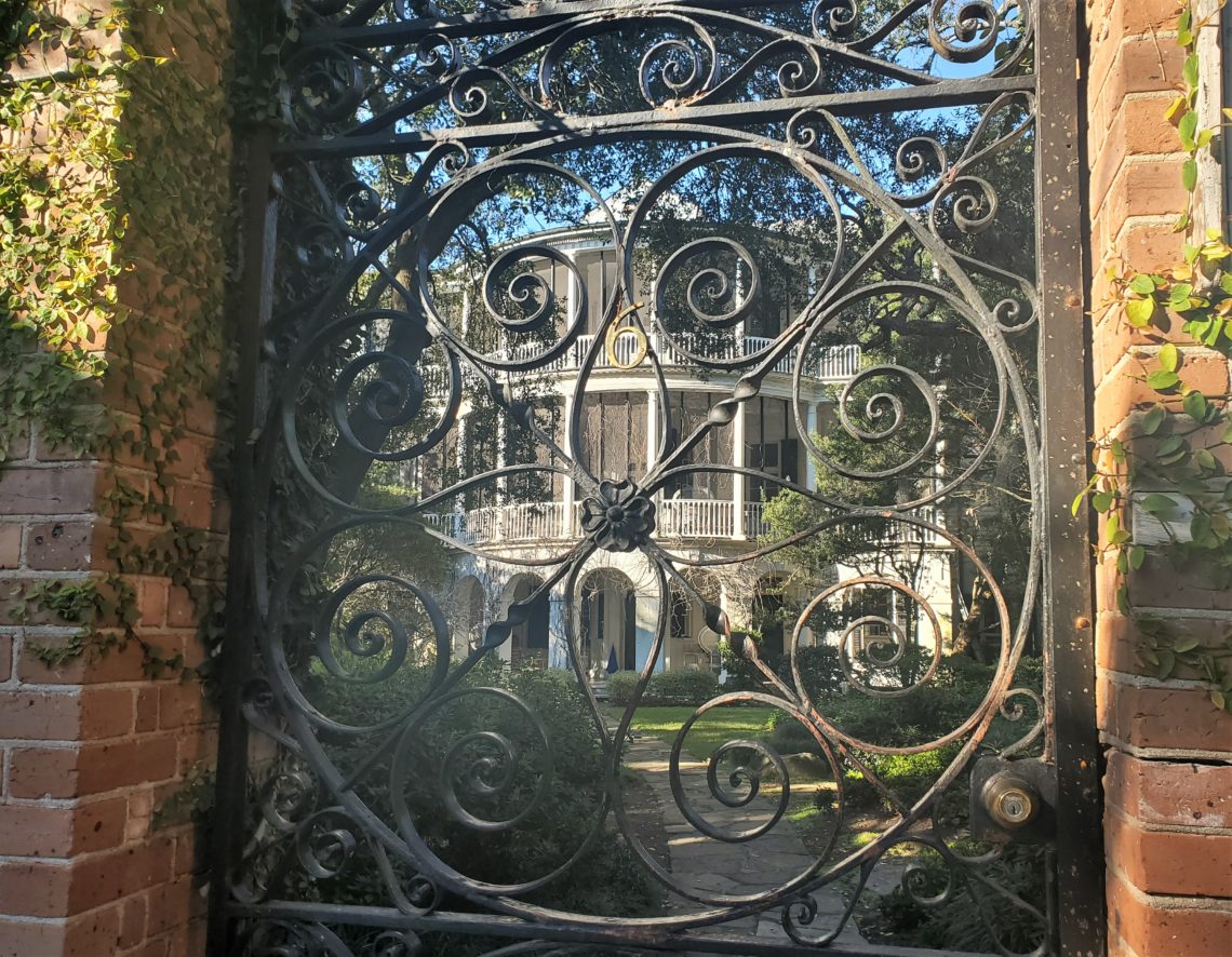 The afternoon sun lighting up the Parker-Drayton House and gate on Gibbes Street. Before lanfill was added to create the existing profile of the peninsula, the house would have had a great view of the marshes and the Ashley River.