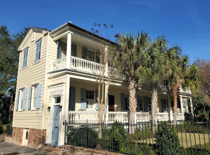 Built in 1865 on Legare Street, this house is a great example of the Charleston single house. The main entrance is in the middle of the porch. The blue door facing the street is a "hospitality door" -- which when left open indicated that the resident was receiving guests. If it was closed, you should get the message.